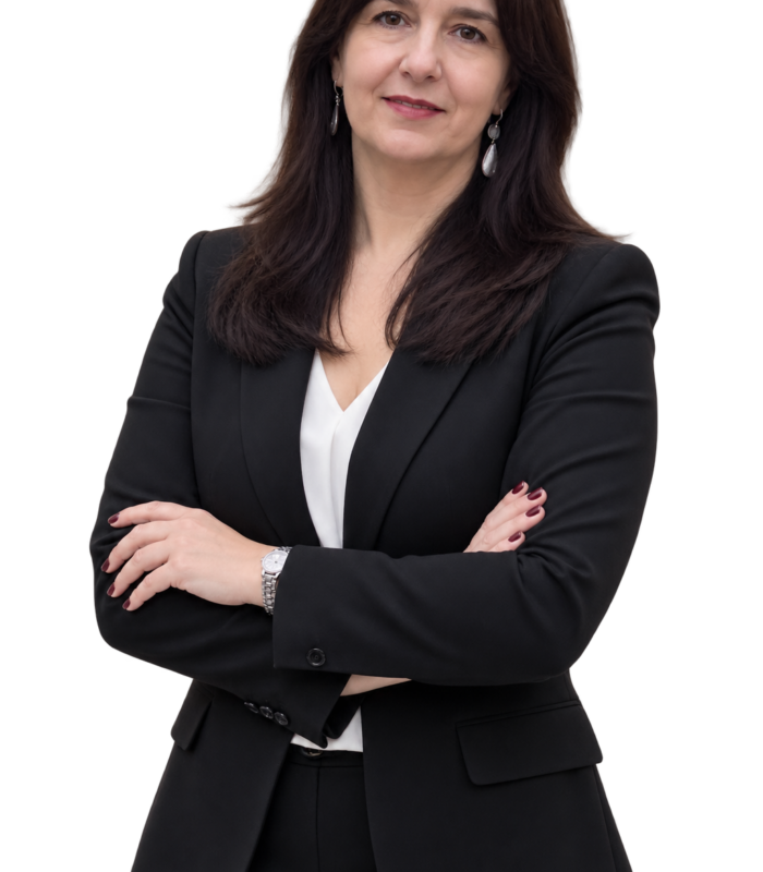 Meet Our Team - Professional and Welcoming Group at a Conference Table Faces the Camera, Team Leader Sitting on the Table with Arms Folded